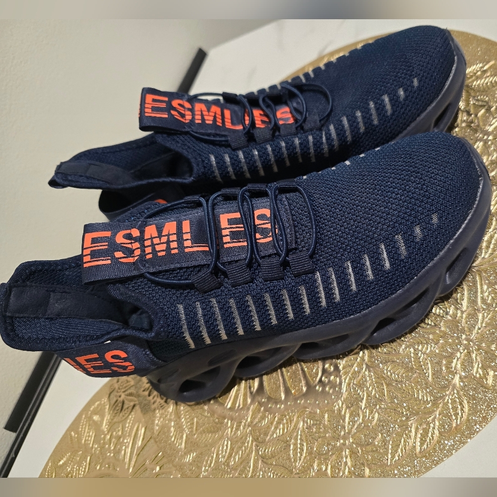 Navy Blue Athletic Sneakers with Orange Accents